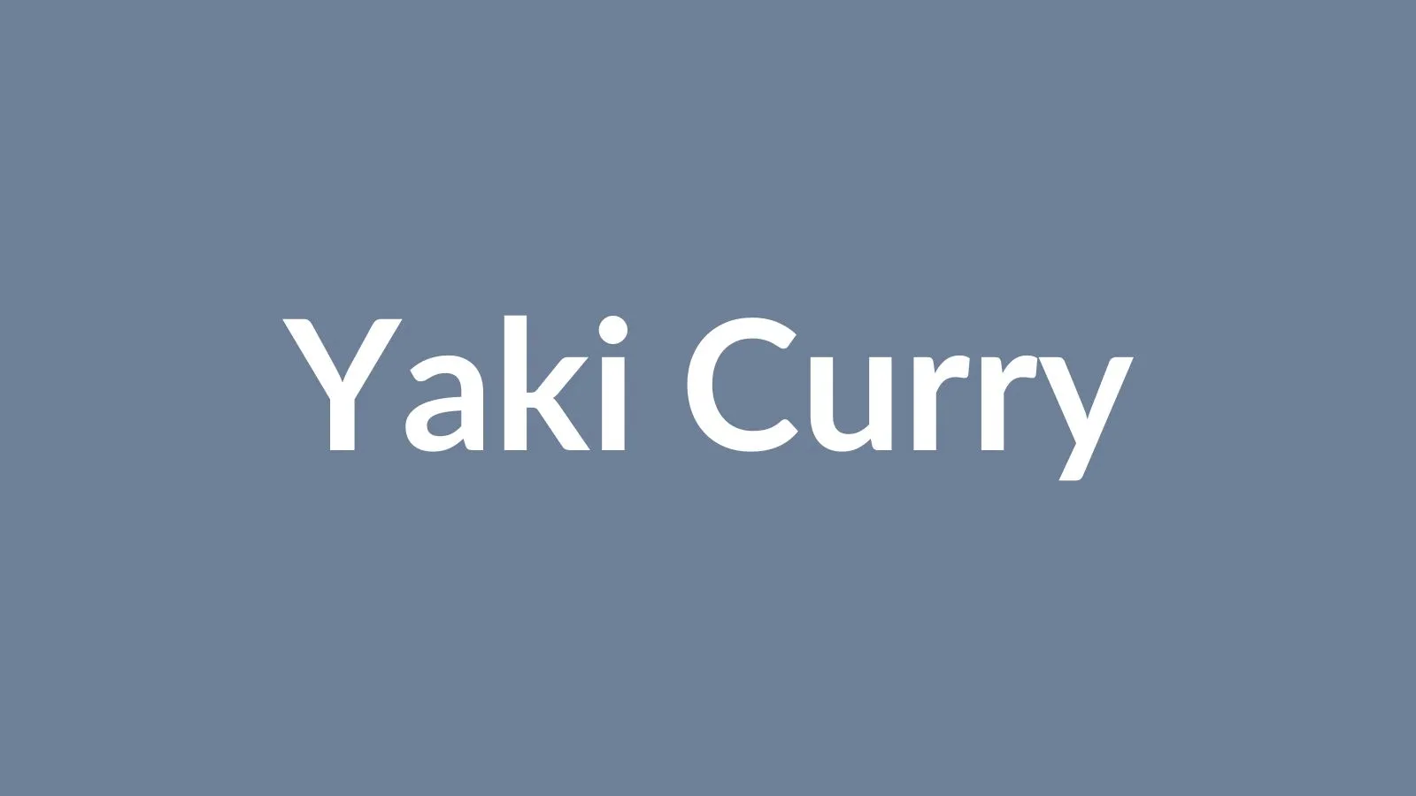 黄金色に焼き上がった卵がのった門司港名物の焼きカレー — 鉄製容器に入ったカレーライスのグラタン